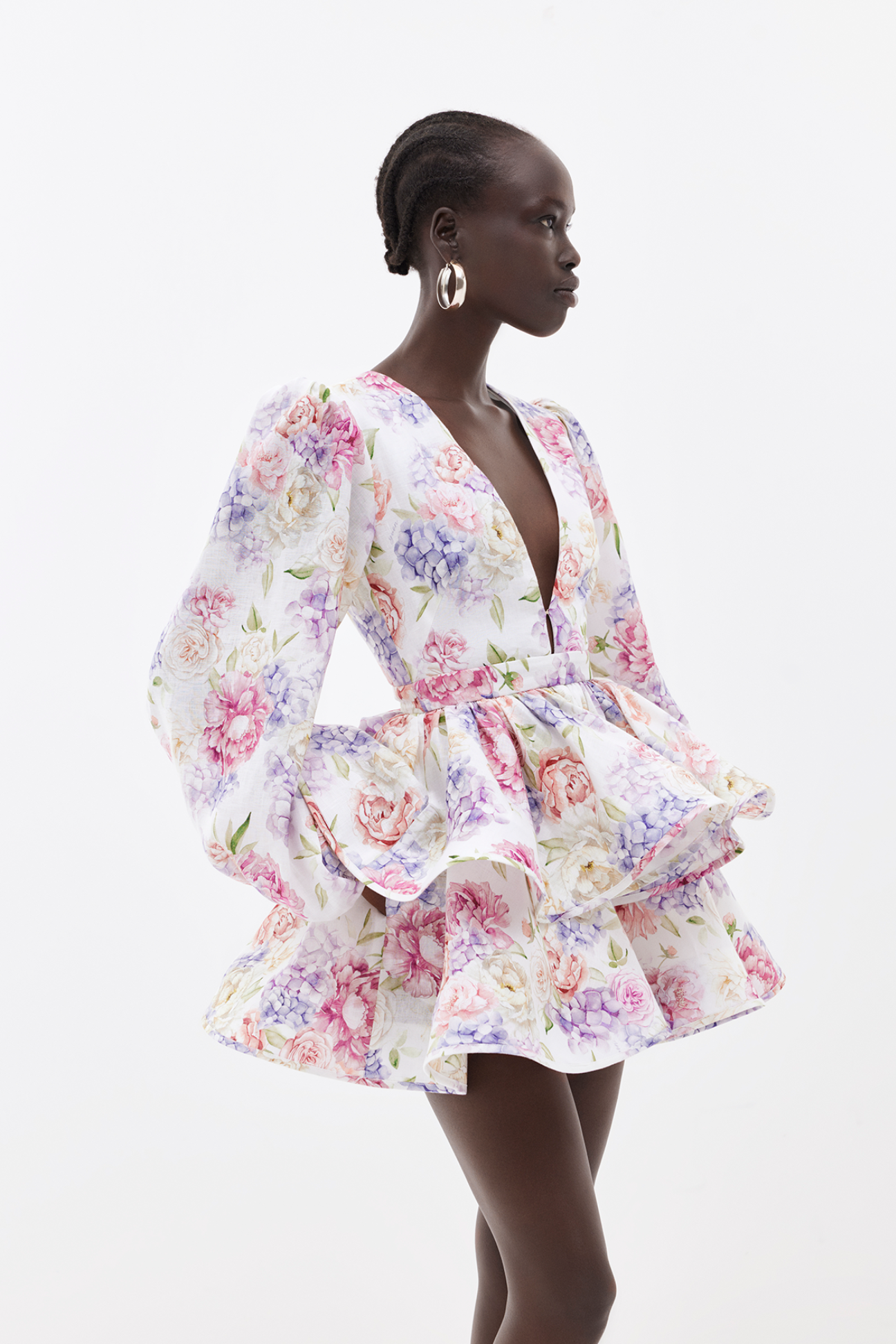 Damen Minikleid mit Blumenmuster tiefem V-Ausschnitt Ballonärmeln und Stufenrock